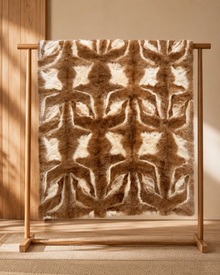 1970s alpaca wool blanket hanging on a wood rack