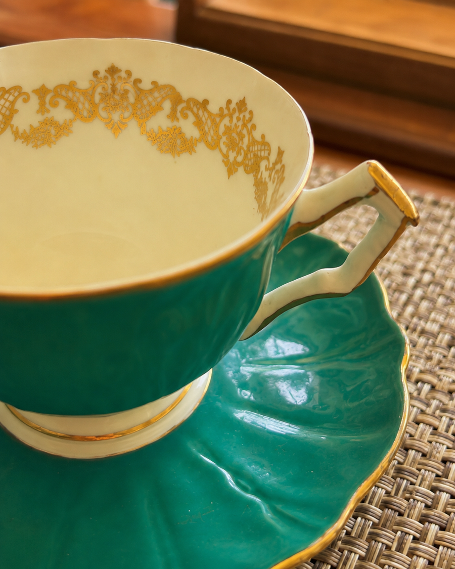 Aynsley turquoise bone china teacup and saucer with gold trim
