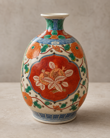 Reverse side of Chinese multicolor porcelain vase with red floral medallion