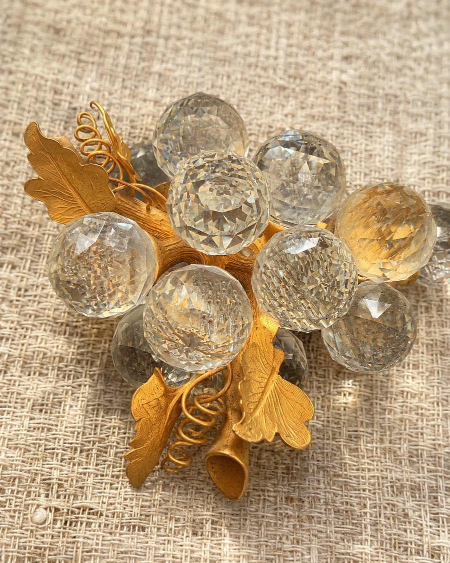 Crystal-look grape cluster brooch with gold-tone leaves