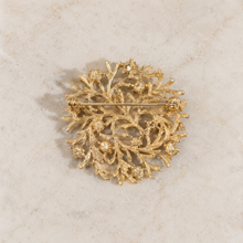 Back view of gold-tone branch rhinestone brooch with pin clasp